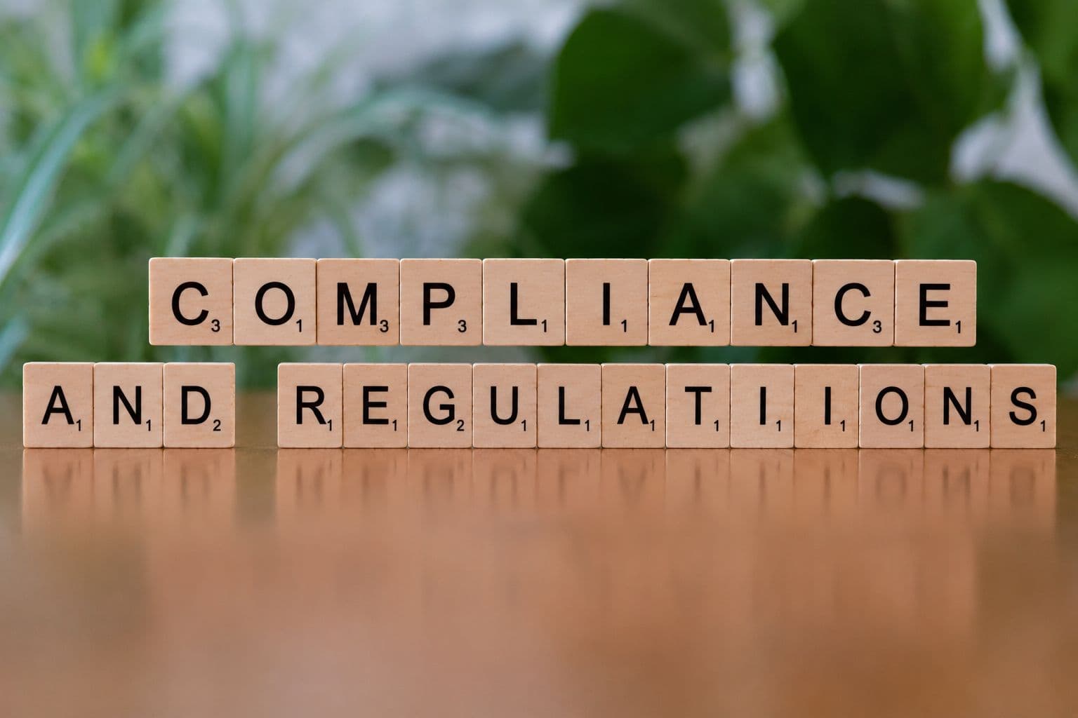 Compliance and Regulations scrabble tiles
